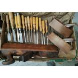 A mixed set of variously sized vintage chisels, some named, a large McBean plane and two smaller