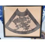 A Japanese framed cut out of fan decorative section