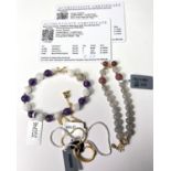 A Labradorite and Ruby quartz bead bracelet with gold plated silver filaments; a similar quartz,