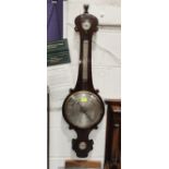 An early19th century mercury column barometer with thermometer in mahogany banjo shaped case