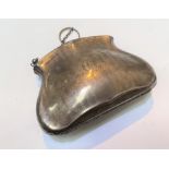 A hallmarked silver engine turned evening purse, monogrammed, Birmingham 1911, 3.5gm; a hallmarked