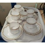 A Continental set of 6 china cups and saucers with gilt decoration; 4 floral side plates; a small