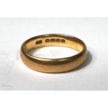 A 22 carat hallmarked gold wedding ring, size O/P, 5.7gm