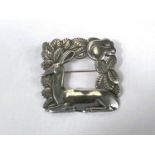 Georg Jensen:  a pierced square brooch with kneeling deer and squirrel amongst foliage, numbered