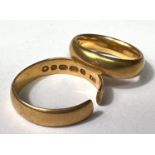 Two 22 carat hallmarked gold wedding rings (1 cut), 10.1gm