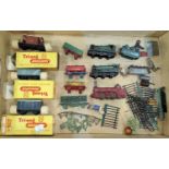A selection of Dinky Meccano TT gauge locomotives, carriages, three boxed Tri-ang TT gauge trucks