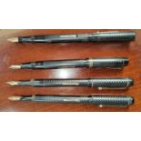 Four vintage fountain pens "The John Bull Pen", "The John Bull Pen No 2" x2 and a similar "The Air