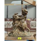 A large gilded bronzed spelter table lamp - cherubs with goat on marble plinth, with small lampshade