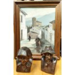 A small oil on canvas painting of a continental street scene, two Bavarian style carved wooden heads
