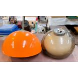 A mid 20th century orange designer plastic light bowl ceiling light and another in clear brown