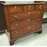 An Irish19th century mahogany chest of three long and three short drawers with painted advertising