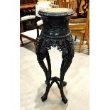 A Chinese tall plant stand in carved and pierced hardwood, with inset marble top, height 97cm
