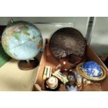 A world globe and other decorative items