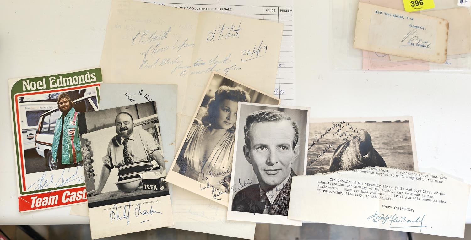 A selection of signed black and white pictures of stars and letters with signatures etc