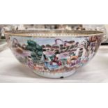 An 18th century Qianlong Mandarin palette punch bowl with highly detailed panelled scenes to the