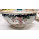 A 19th century Qianlong Mandarin palette good size punch bowl decorated with panels of hunting