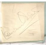 A mounted signature by Lawrence Olivier in pencil