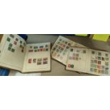 A selection of pre-war stamp albums; loose stamps; cigarette cards