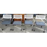 Four modern designer office chairs in chrome white and grey