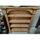 A stripped pine traditional style bookcase four height, height 122cm, length 111cm and depth 31cm