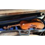 A small size violin and 2 bows, in case (violin a/f)