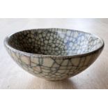 A small Chinese crackle glazed bowl on small pedestal foot, dia 10.5cm