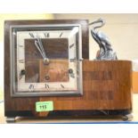 AN ART DECO CLOCK, walnut veneered cubist case with stork surmount, Westminster chimes movement,