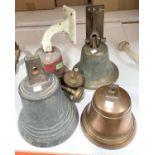 4 brass/bronze bells, 2 with wall brackets etc