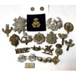 A collection of mainly infantry military badges etc.