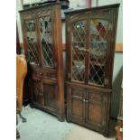 A Jaycee oak leaded glass full height corner cupboard with display top and double cupboard bellow (