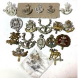 A collection of mainly infantry military badges etc.