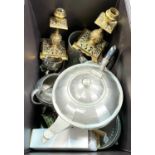 A 1930's pewter tea set; ornate brass candlesticks; etc.