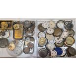A quantity of antique watch parts.