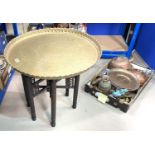 A brass top oriental occasional table; a copper log box and decorative metalware