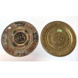 A Burmese tricolour brass plaque with relief decoration; a similar plaque, diameter 31cm