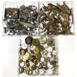 A quantity of antique watch parts; a large selection of metal straps.