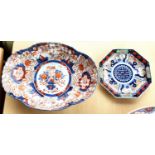 A large oval 19th century Imari bowl. length 41cm (riveted restoration); an octagonal Imari plate,