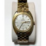 A 1960's gentleman's Omega Constellation wristwatch, baton numerals on integral strap with