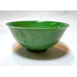 A Chinese ceramic jade coloured bowl, with incised dragon decoration to the outside, six character
