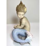 A Nao figure:  girl mermaid with fish