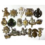 A selection of military badges etc.