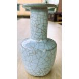 A Chinese pale green crackle glazed vase with flared rim, height 18cm