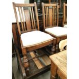 A 1930's set of 4 oak dining chairs