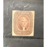A U.S.A postal stamp Jefferson 5 cents in brown red
