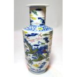 A Chinese rouleau shaped vase decorated in underglaze blue and polychrome with "Imperia" 5 claw