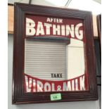 A stained wood framed advertising mirror, lettered 'After Bathing Take Virol & Milk' 28.5x24cm