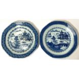 A pair of Chinese 19th century blue and white octagonal plates with traditional decoration, diameter