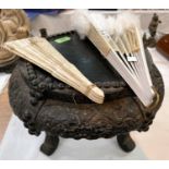 An oriental hardwood stool and two fans