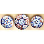 Three late 19th/early 20th century Imari dishes, 2 x dia. 18cm, 1 x dia. 22cm