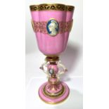 A 19th century Minton pink and gilt goblet with Greek head oval cameo portraits, lobed shape, pink